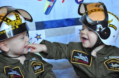 This is a photo of my sons wearing their Halloween costumes while playing in their room.  Air Force sons, and future pilots!