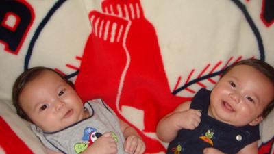 Four-month Old Bryce and Aiden are hanging out on their favorite blanket.