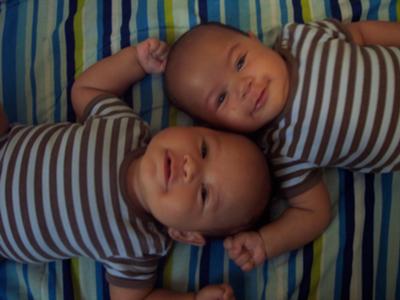 BROTHERLY LOVE!  RELAXING IN BED