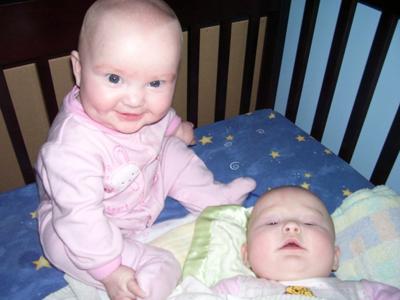 Ariana waking her sister, Paloma. What a devilish smile!