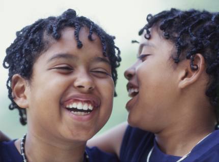 Identical Twin Sisters Bonding