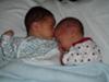Kye letting his baby sis rest on him!